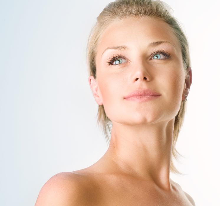 blonde woman looking upward | botox for tmd brentwood tn