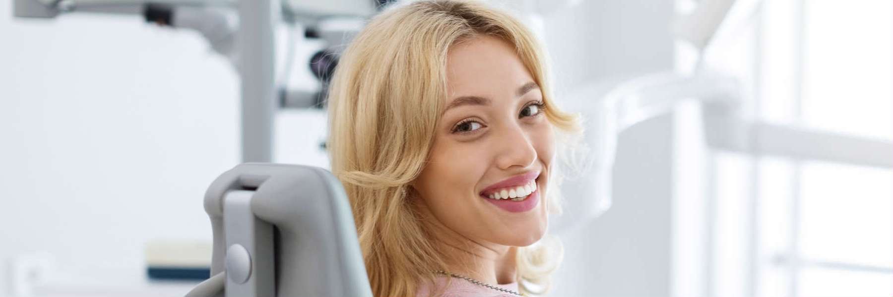woman in an exam room for her teeth cleaning in brentwood tn