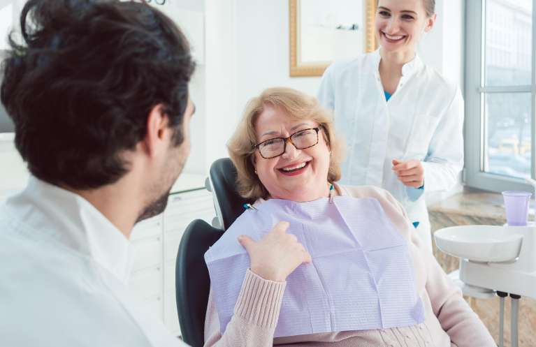 older woman at her dentist in brentwood tn