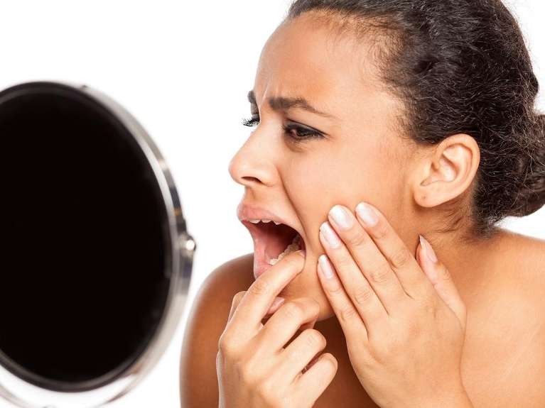 brentwood dentist | woman with tooth pain