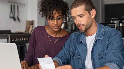 young couple going over their dental insurance in brentwood tn